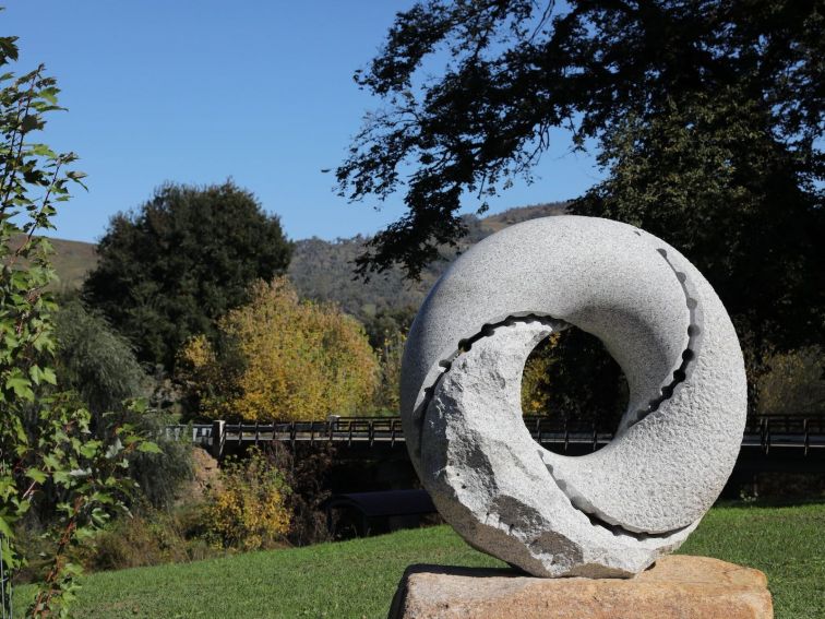 Granite sculpture, using the Mobius strip, located in Tooma Park