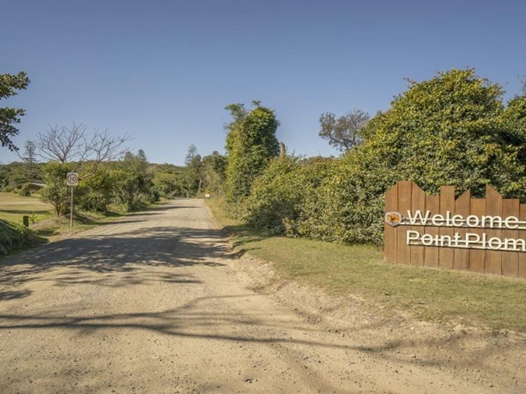 Entrance driveway to Point Plomer Campground and Plomer Beach House in Limeburners Creek National