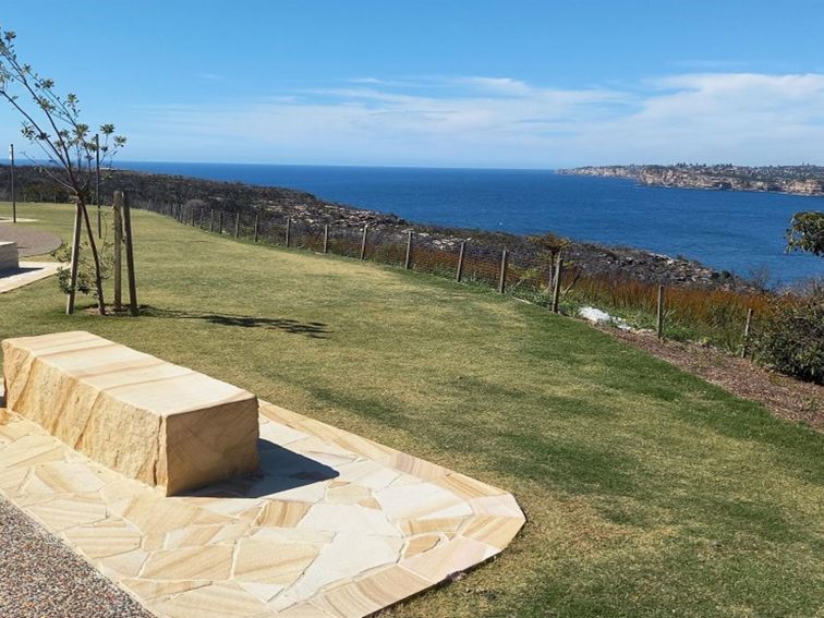 Sandstone seat overlooking the ocean at North Head lookout, Sydney Harbour National Park. Photo: