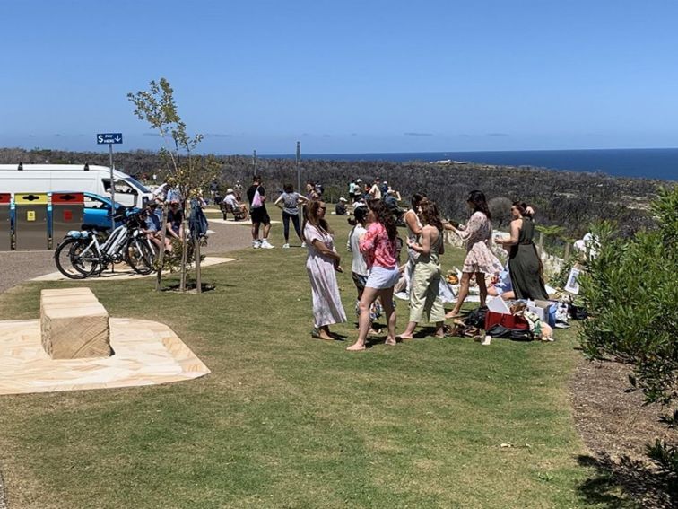Visitors enjoying a picnic at North Head lookout, Sydney Harbour National Park. Photo: Katherine