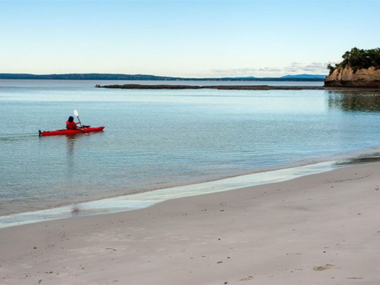 A kayaker at Red Point in Jervis Bay National Park. Photo: Michael Van Ewijk &copy; DPIE