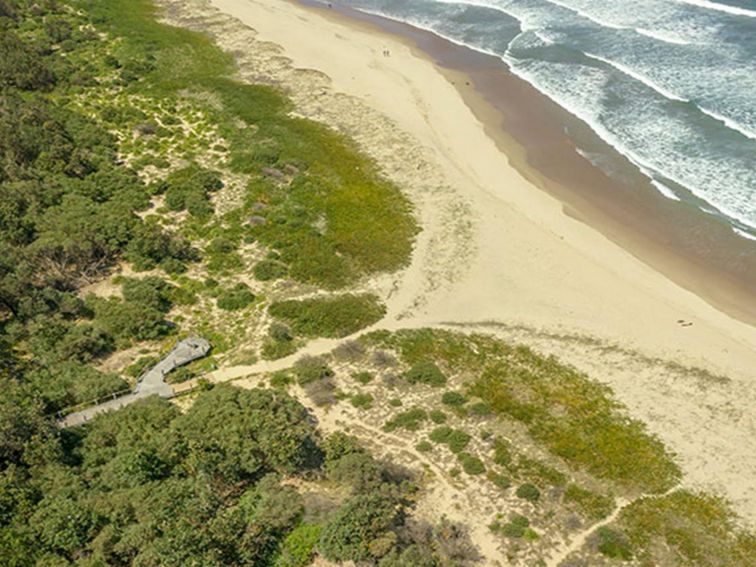 Aerial view of beach access from Beach Road in Seven Mile Beach National Park. Photo: John Spencer