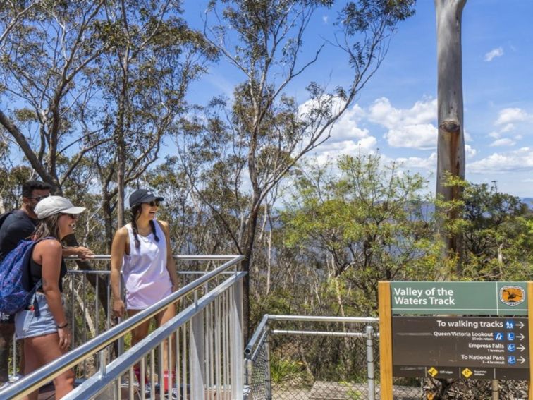 A group of friends at Valley of the Waters lookout in the Katoomba area of Blue Mountains National