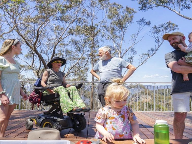 Visitors enjoying a day out at the scenic Valley of the Waters lookout, in the Katoomba area of Blue
