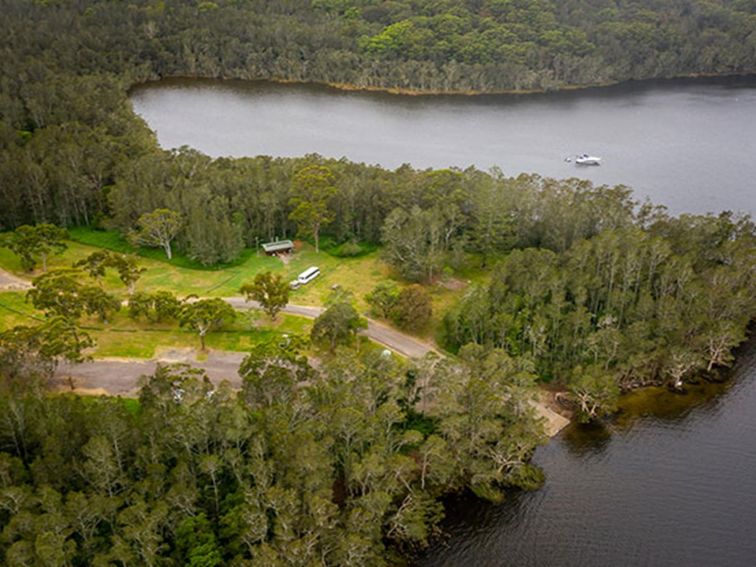 Aerial view of Violet Hill campground and picnic area with surrounding bushland and waterways in
