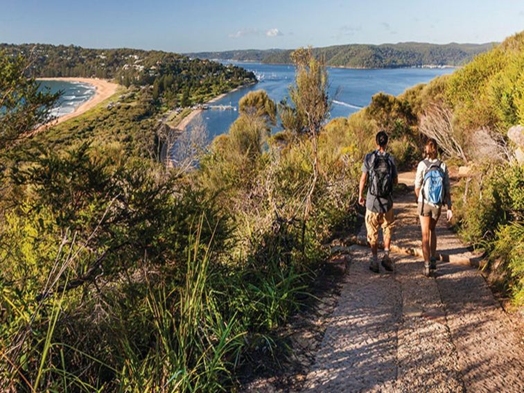 Walkers descending the track from Barrenjoey Head in Ku-Ring-Gai Chase National Park. Photo: D