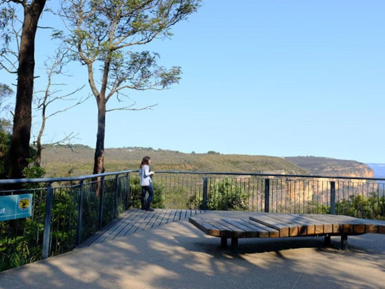 A visitor enjoys views at Jamison lookout, Wentworth Falls picnic area, Blue Mountains National Park