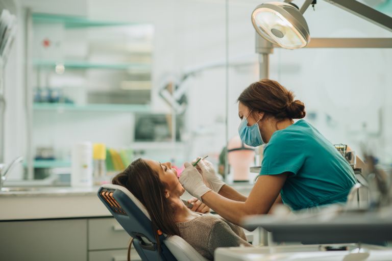 Dentist with patient