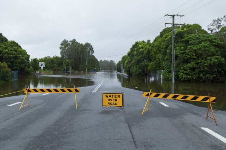 Grants flooded road and signs