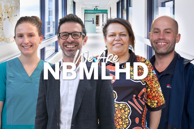Four smiling staff members in a hospital hallway with We Are NBMLHD text graphic