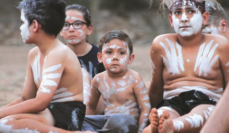 Aboriginal children with traditional ochre paint