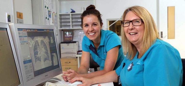 Two Allied Health workers smiling