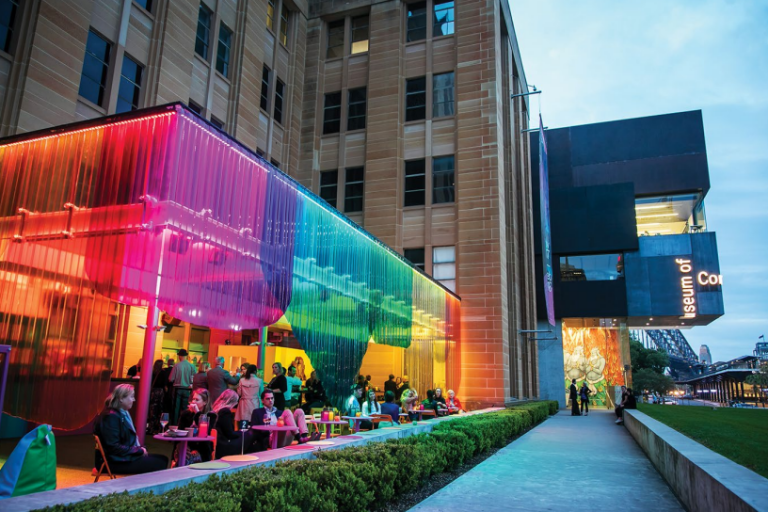 Coloured lights adorn entertainment area beside Museum Contemporary Art NSW