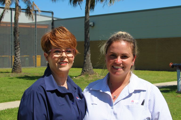 Two JH workers in uniform