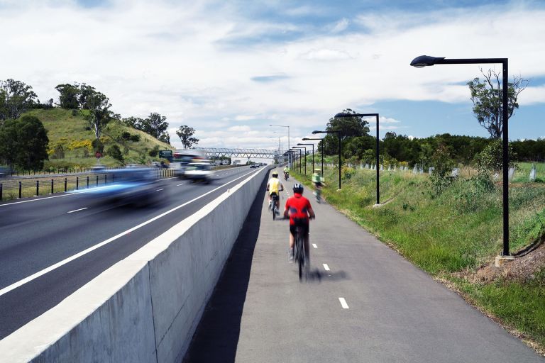 SmartInfrastructureDesignSpecifications.jpg Alt Text: Several cyclists ride along a pathway alongside a road, with the cyclists and cars blurred to show they're moving.
