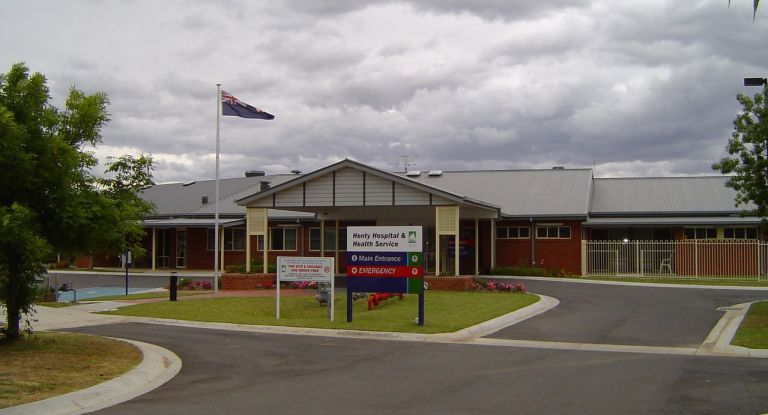 Main entrance to the Henty Multipurpose Service. A sign indicating the main and emergency entry points is positioned in front of the entrance.