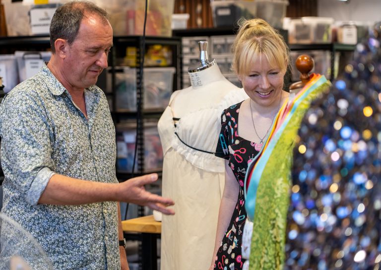 Costume Manager at Sydney Theatre Company showing intern a costume