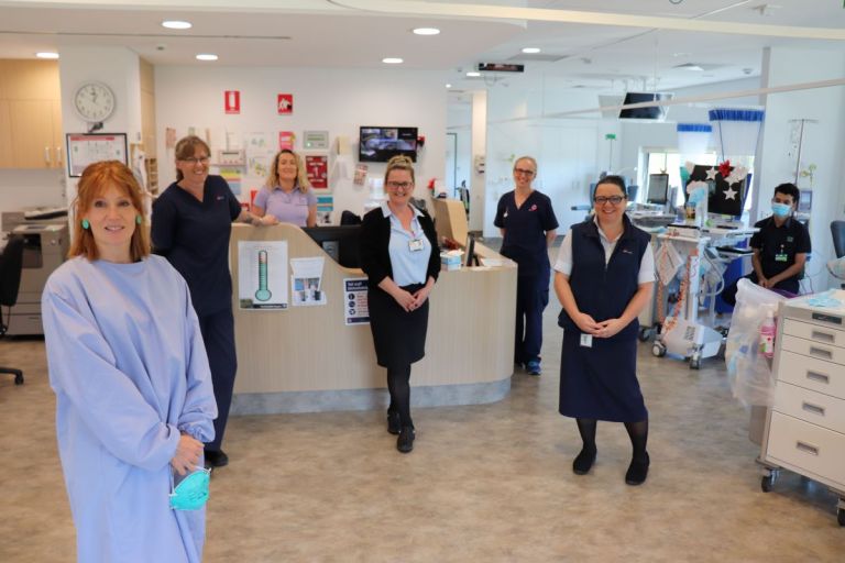 image of health workers in cancer services unit