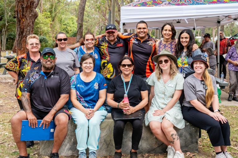 Aboriginal health staff pictured at outside sporting event