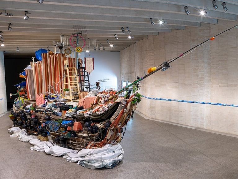 Installation of a boat made up of art material