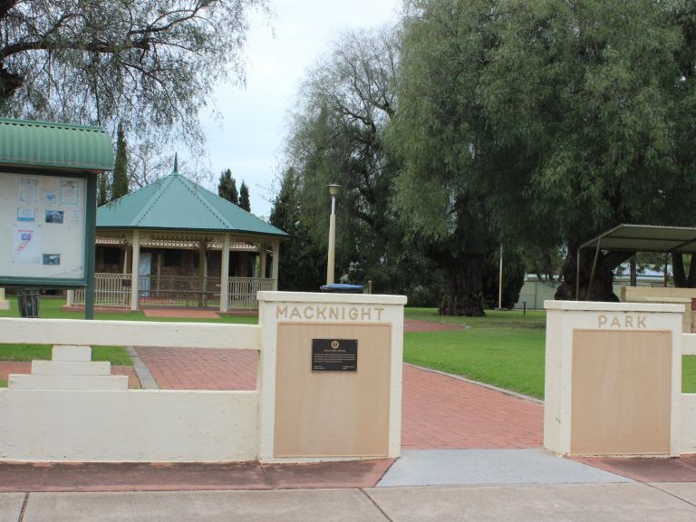 The entrance to MacKnight Park. The gazebo and noticeboard are visible.