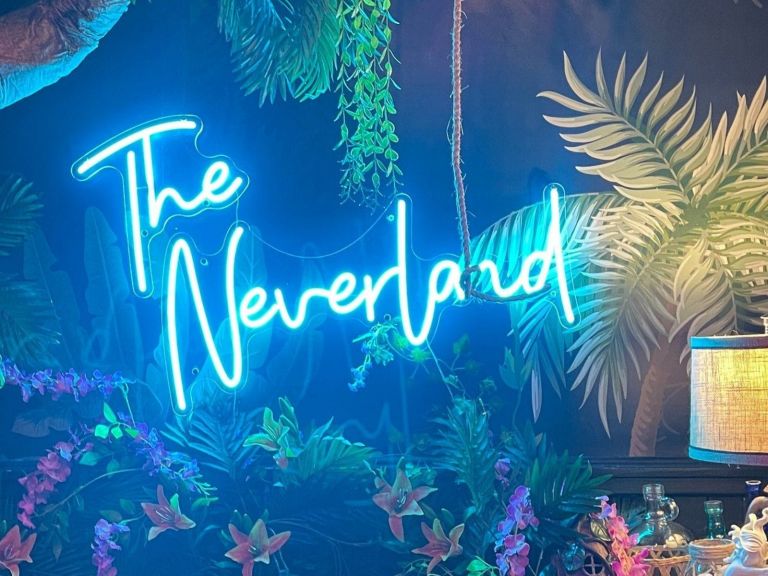 The Neverland blue neon sign