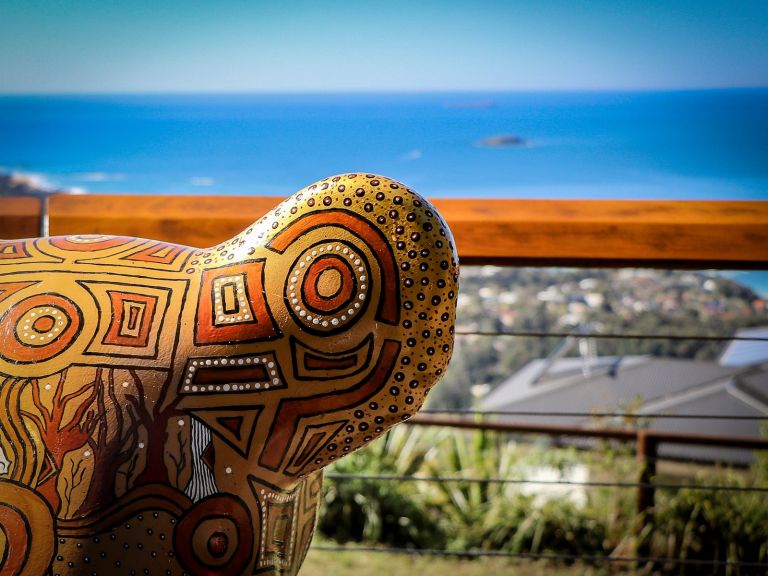 Guula the Koala sculpture takes in the view from Korora Lookout