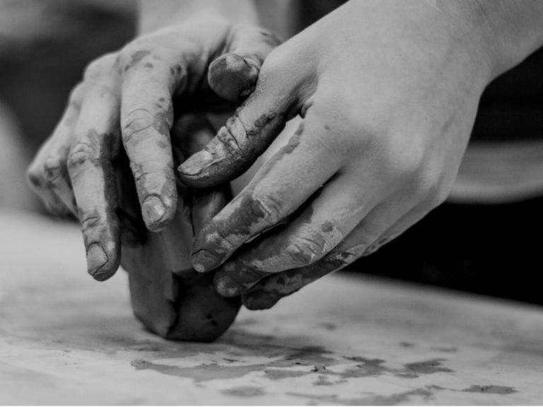 Hnads working clay - blakc and white photo