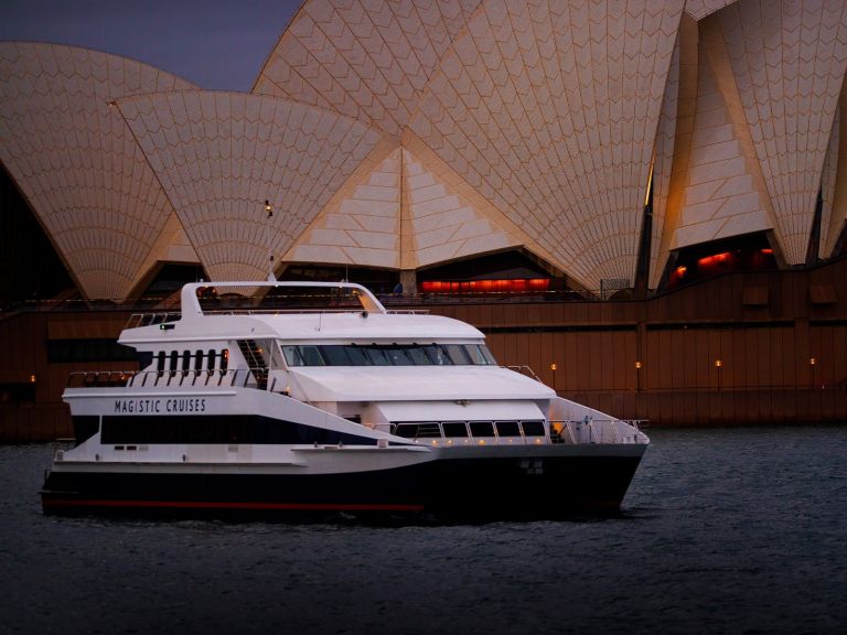 The Magistic dinner cruise gliding past the iconic Opera House and other waterfront attractions.