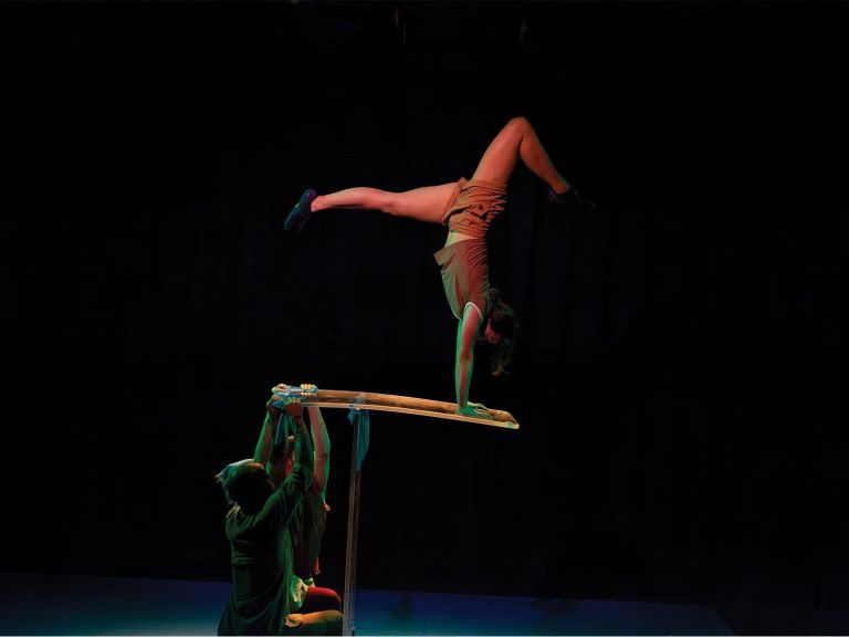 Image of two acrobats on stage