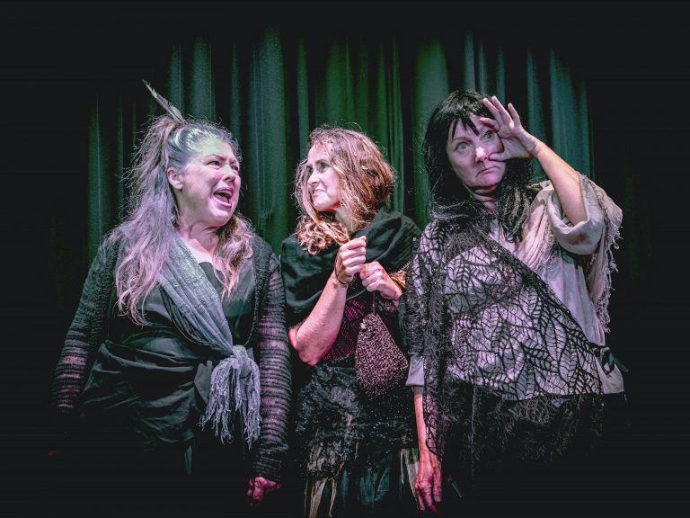 The 3 witches harrass Macbeth