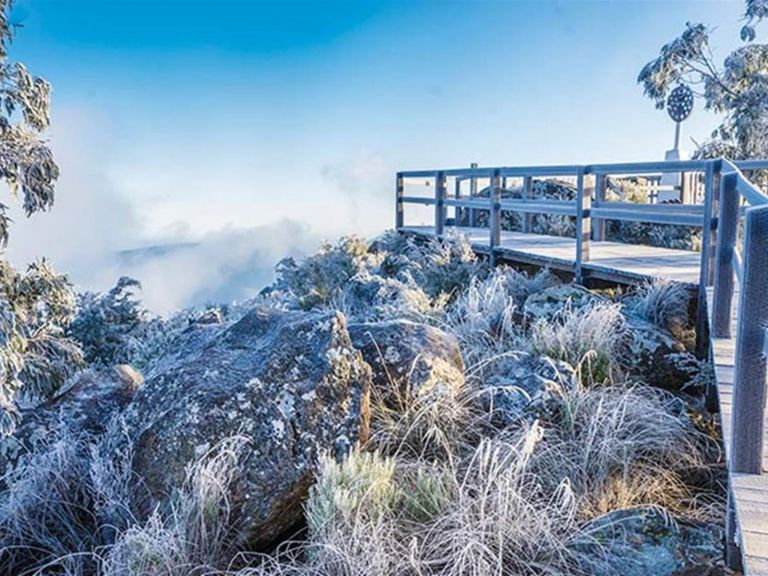 Dusting of light snow around Mount Kaputar Summit lookout. Photo: Simone Cottrell/OEH