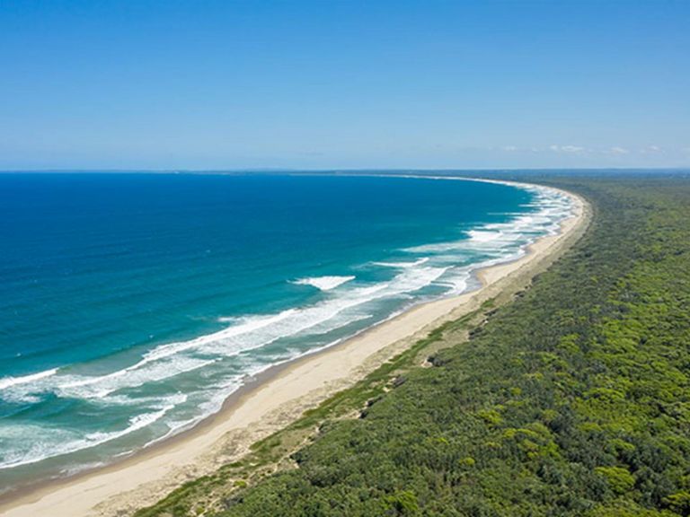 View of Seven Mile Beach looking south in Seven Mile Beach National Park. Photo: John Spencer &copy;