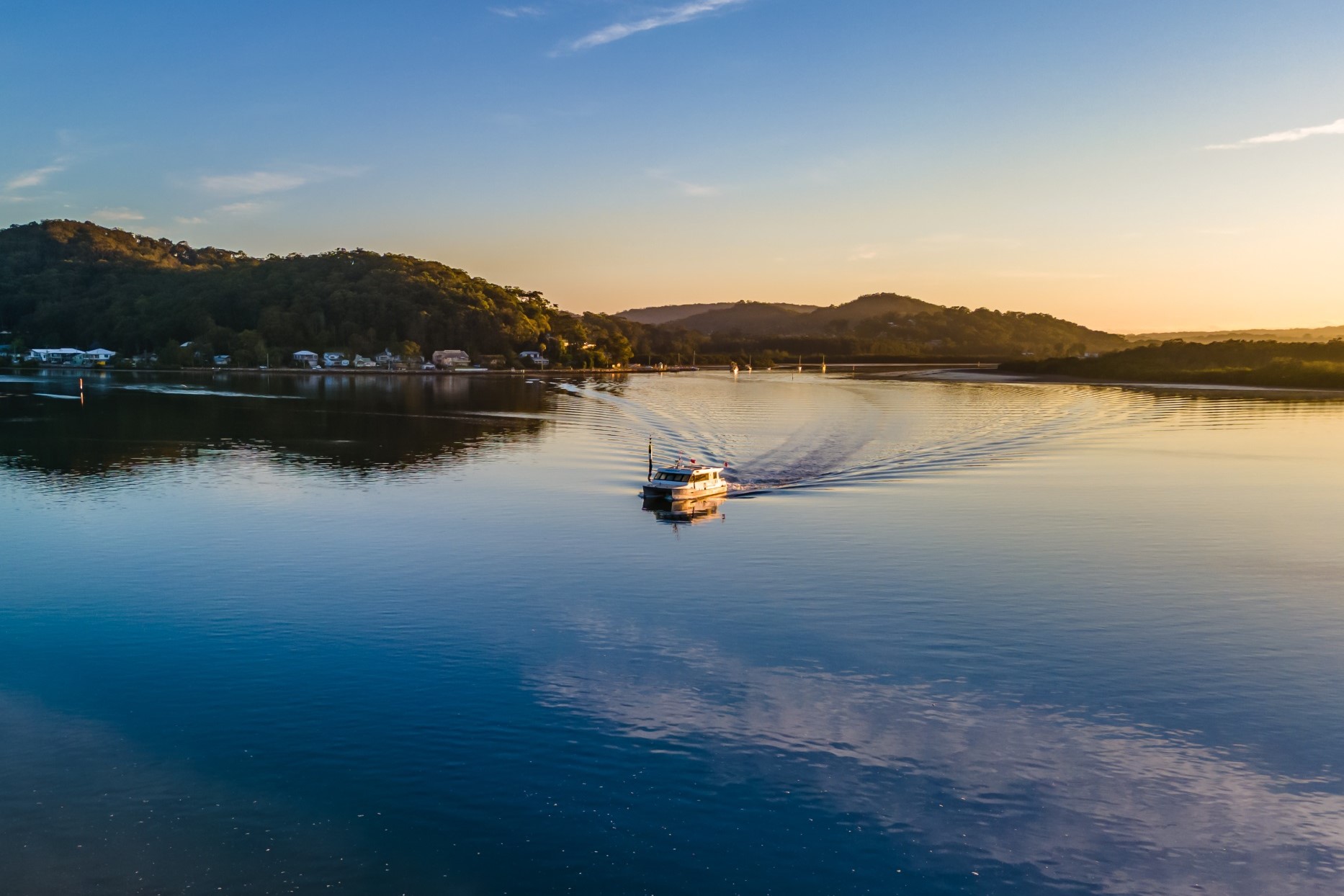 small ferry on a body of water