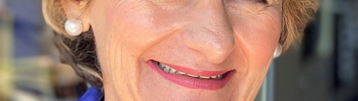 Headshot of Suzanne Colbert smiling 