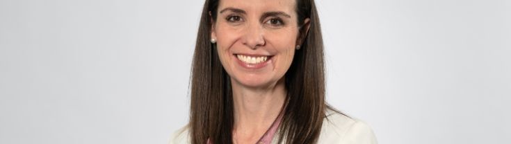 A headshot of Courtney Houssos