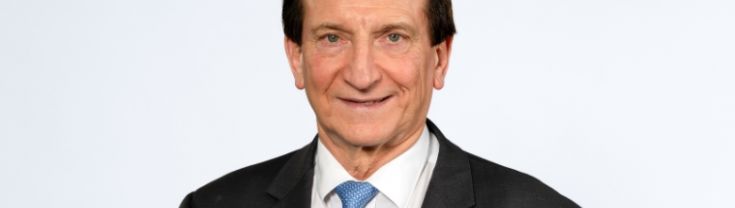 A headshot of Ron Hoenig