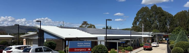 Main entry to the Batlow-Adelong Multipurpose Service. A sign indicating the main and emergency entry points is in the centre of the image.