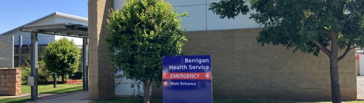 Main entry to the Berrigan Multipurpose Service. A sign indicating the main and emergency entry points is toward the centre of the image.