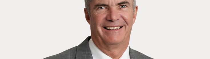 A headshot of Minister Steve Whan