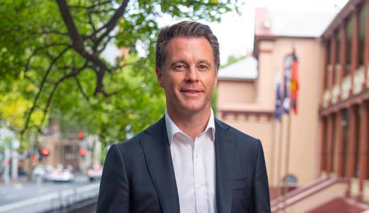 A headshot of NSW Premier Chris Minns outside