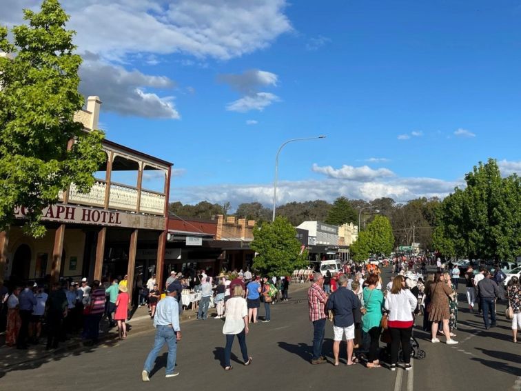 Molong Main Street with market stalls and people