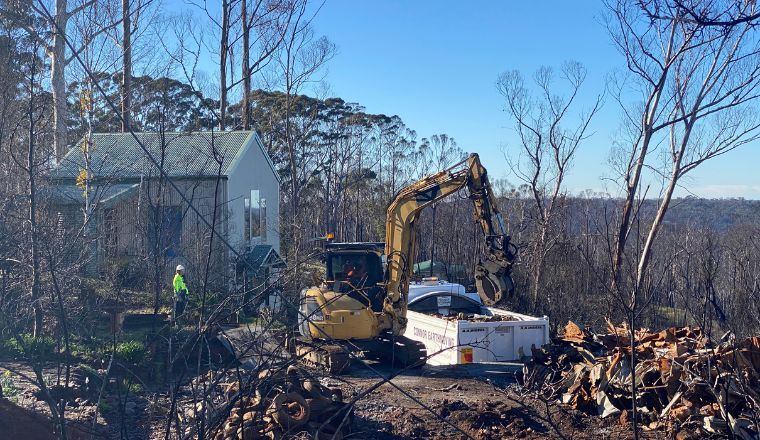 Cleaning up a property damaged by bushfire in NSW Australia
