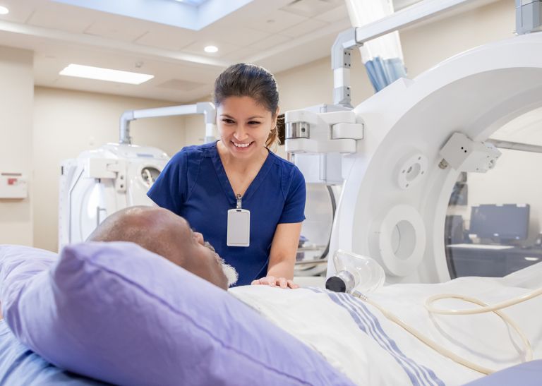 Patient having a CT scan in hospital