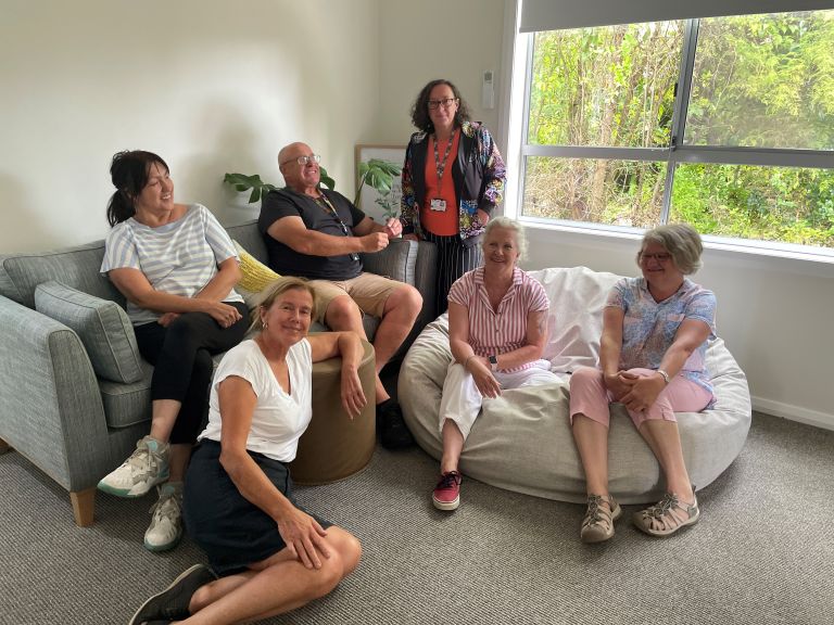 Members of the Bega Safe Haven team sit together in the quiet room
